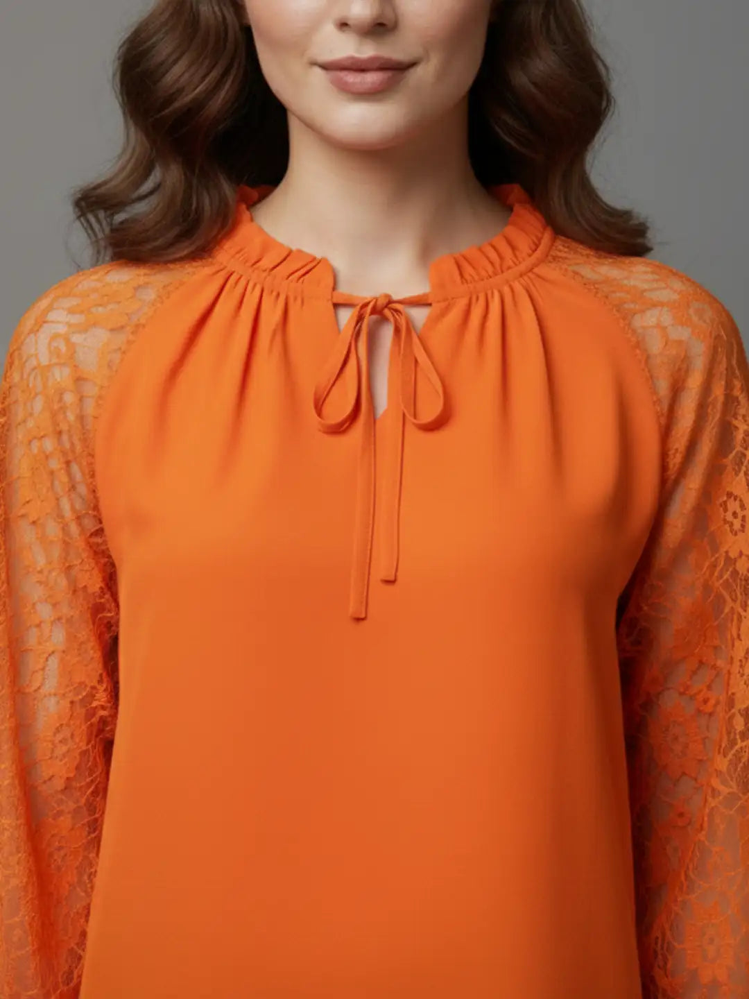 Orange tie-up neck top with sheer lace sleeves