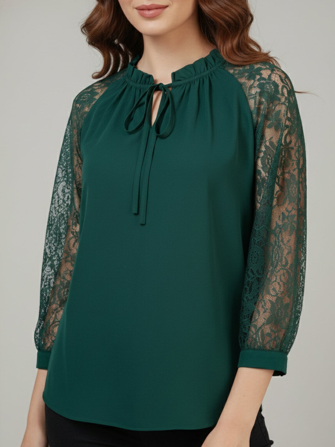 Green tie-up neck top with sheer lace sleeves