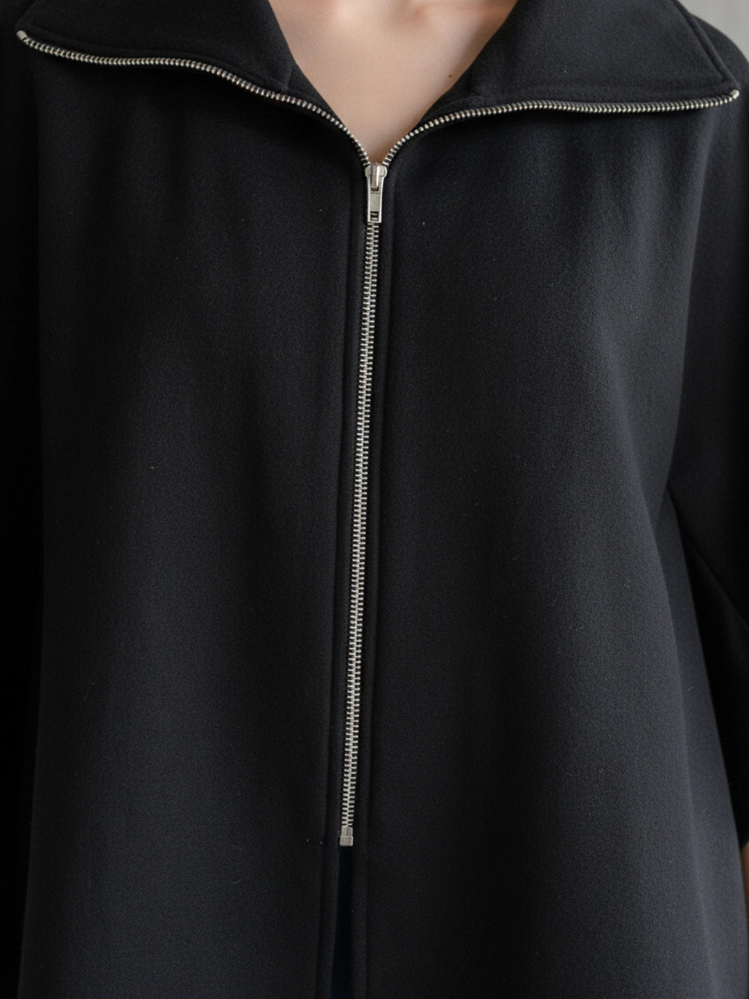 Black front zipper poncho jacket