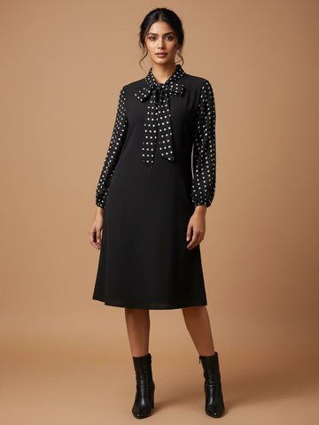 Black polka V-neck tie dress