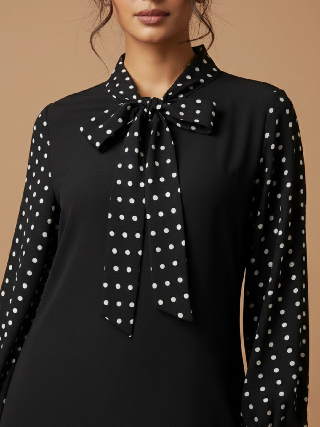 Black polka V-neck tie dress