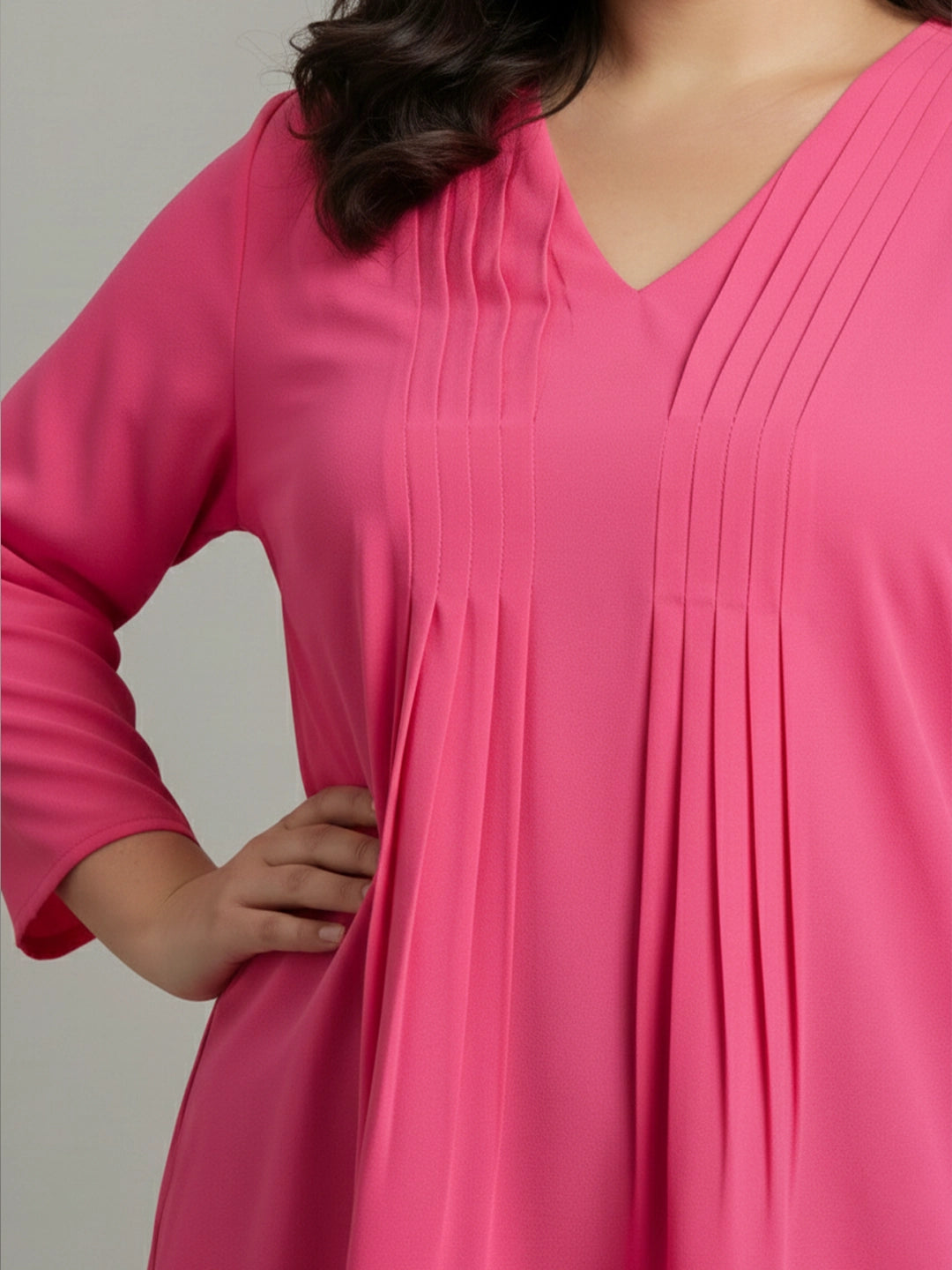 Pink pin tucks tunic top