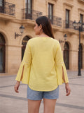 yellow mulmul top — close-up detail