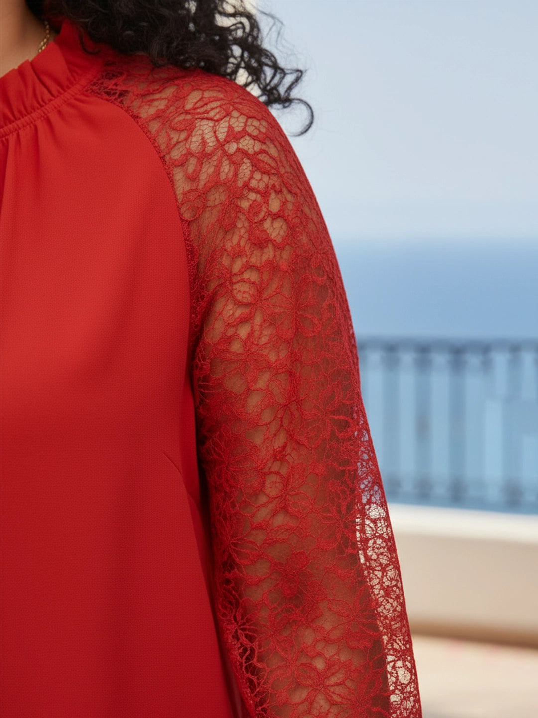 Red tie-up neck top with sheer lace sleeves