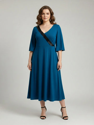 Teal party dress with sequins embelishment