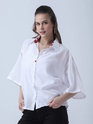 Peplum rayon top with printed neckline