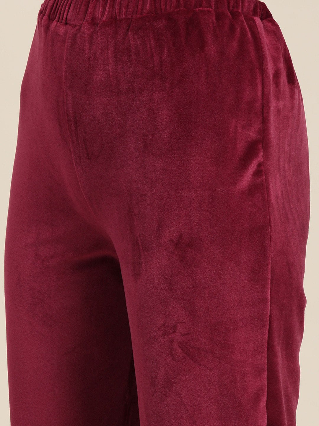 Maroon solid velvet fabric with a front patch pocket. hoodie with co-ord set.