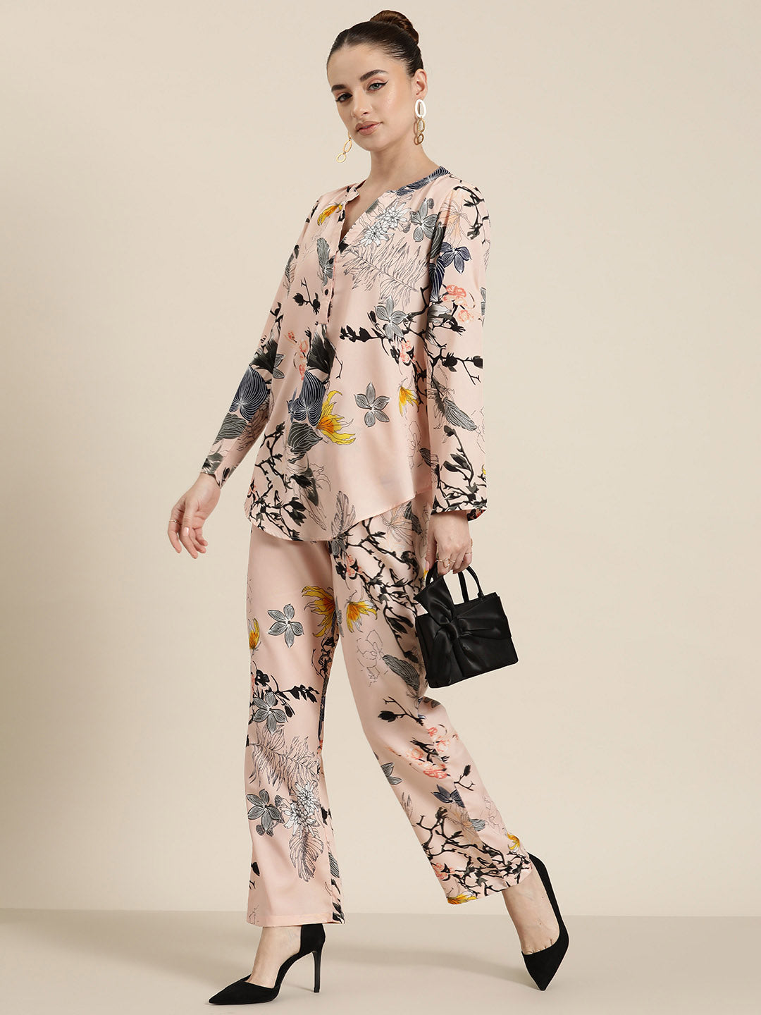 Peach floral half placket shirt and pant co-ord set.