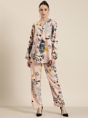 Peach floral half placket shirt and pant co-ord set.