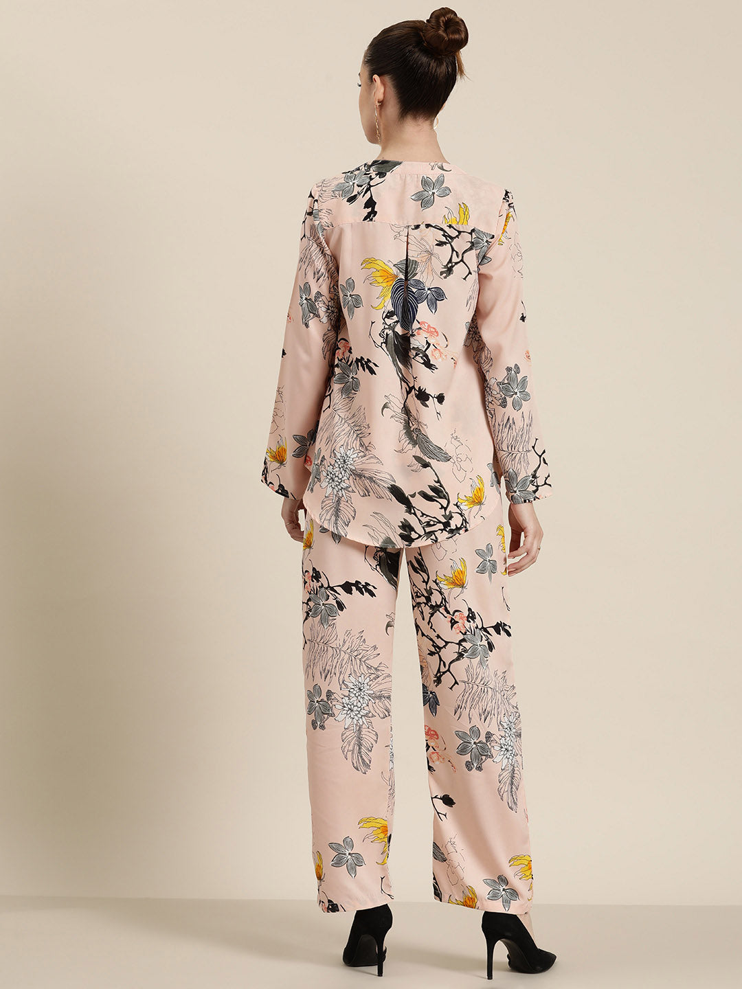 Peach floral half placket shirt and pant co-ord set.