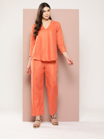 Orange Solid cotton slub V-neck top with regular sleeves with pant co-ord set.