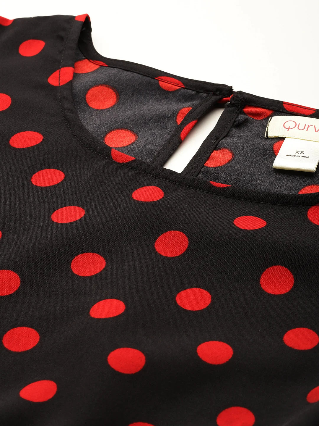 Red and black polka dot top and skirt co-ords sets