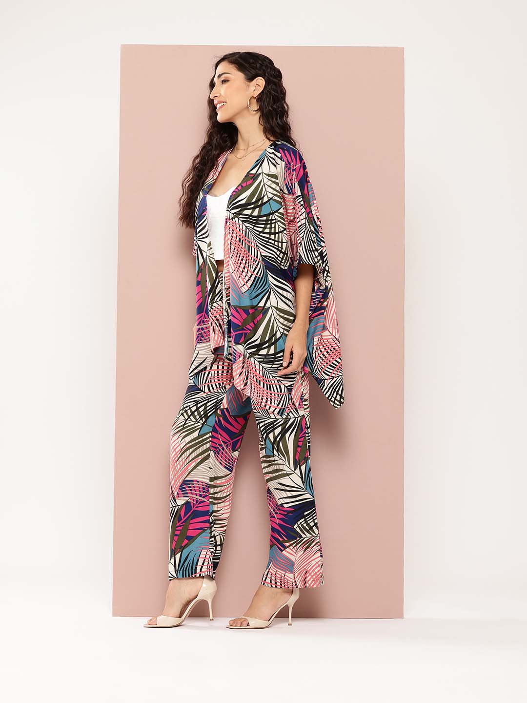 Multi colour tropical print shrug and pant co-ord sets.