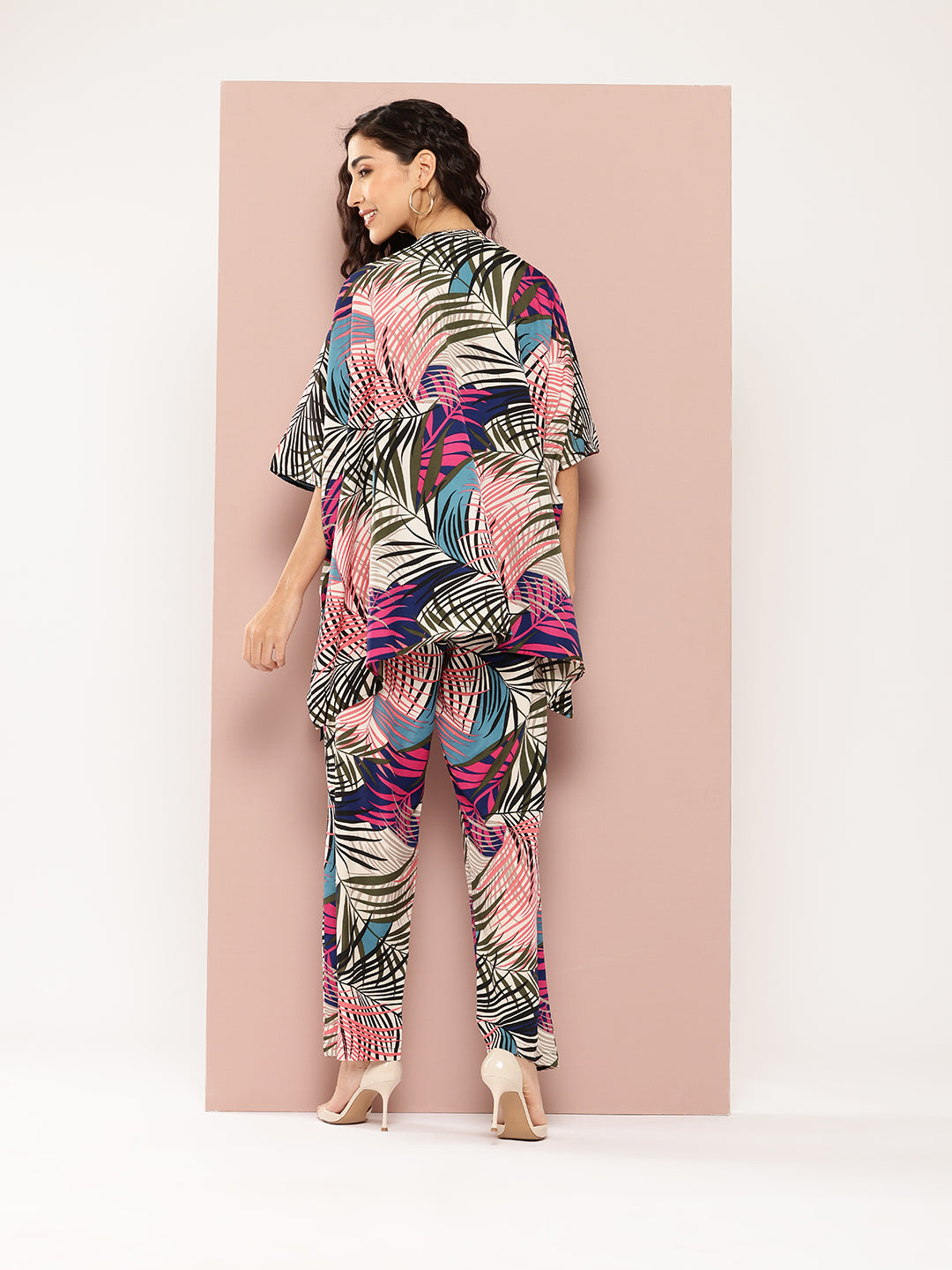 Multi colour tropical print shrug and pant co-ord sets.