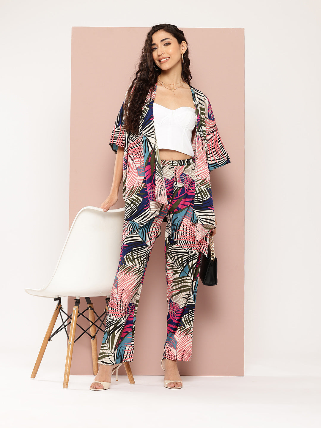 Multi colour tropical print shrug and pant co-ord sets.