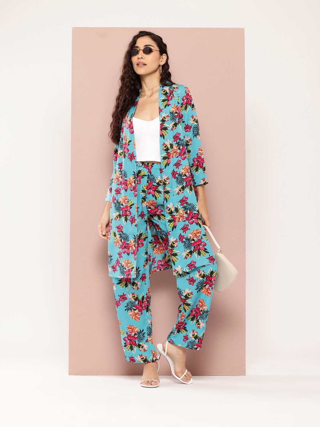 Tropical print shrug and pant co-ord sets.