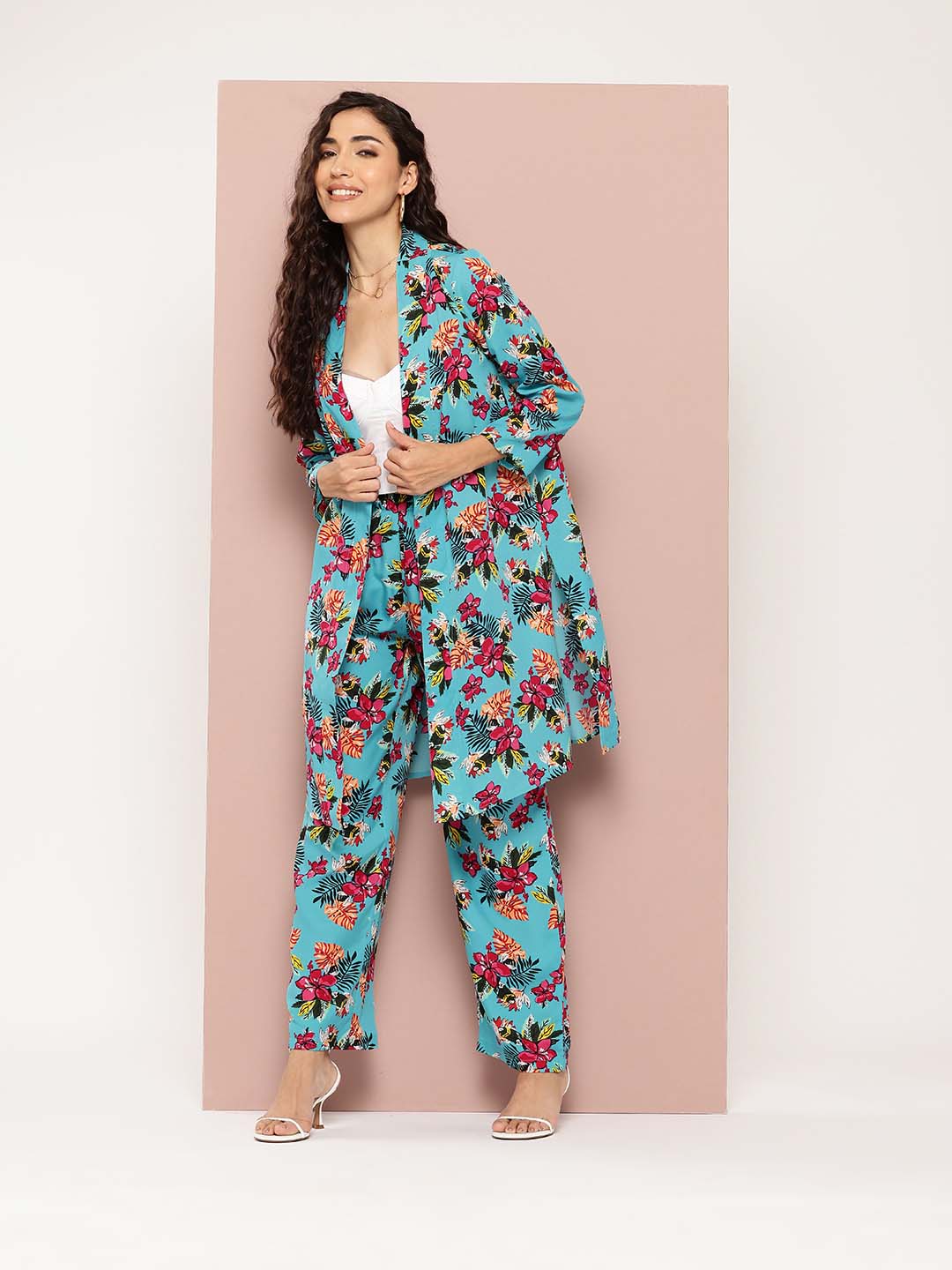 Tropical print shrug and pant co-ord sets.