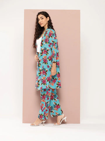 Tropical print shrug and pant co-ord sets.