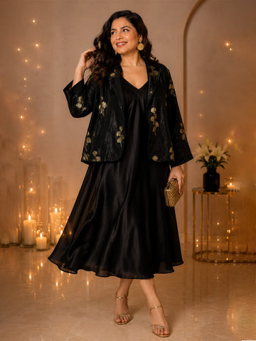 Black blazer with black satin dress