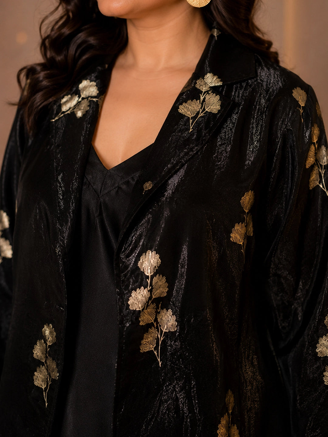 Black blazer with black satin dress