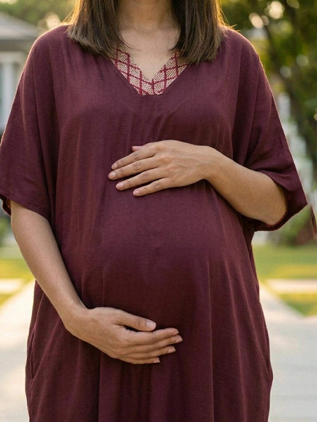 Maroon kaftan with brocade detailing in neck