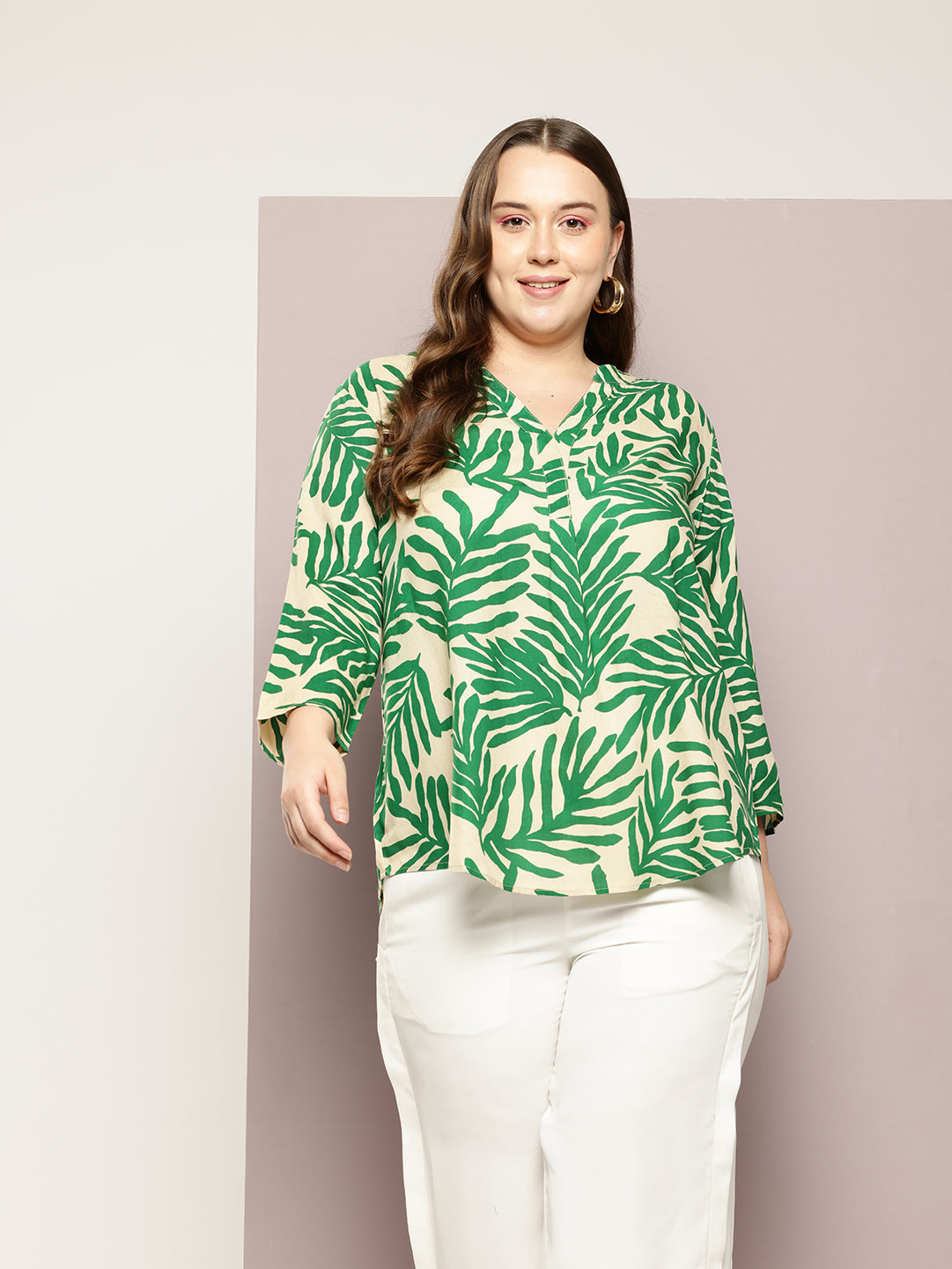 Green shirt with tropical print, featuring a half placket, mandarin collar, and regular sleeve